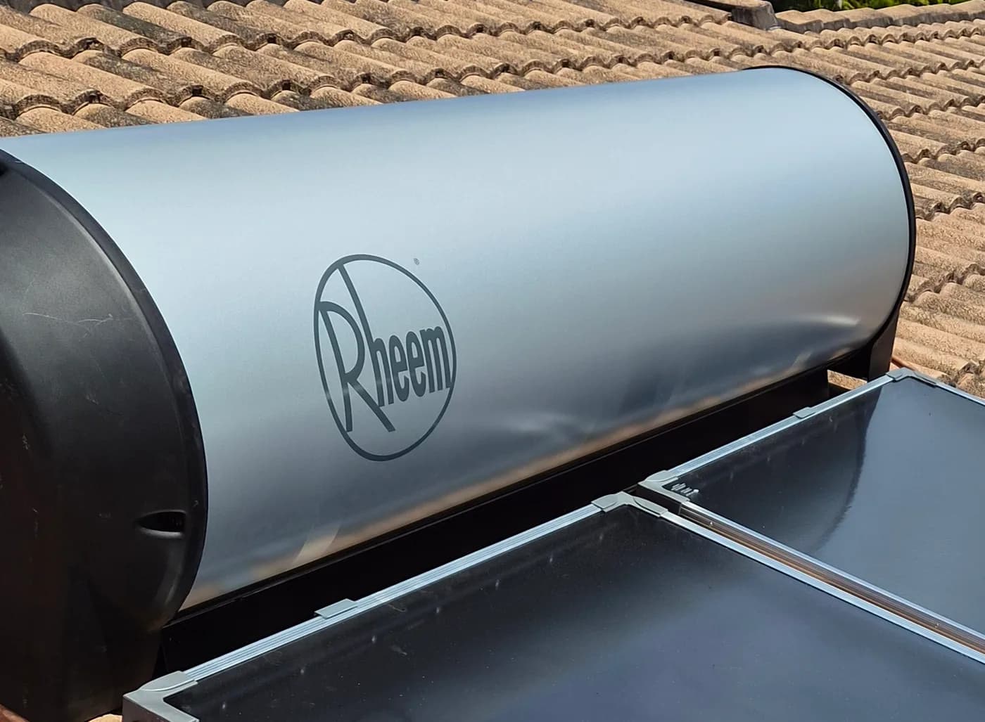 A Rheem solar hot water tank installed by RCM on a Sunshine Coast roof